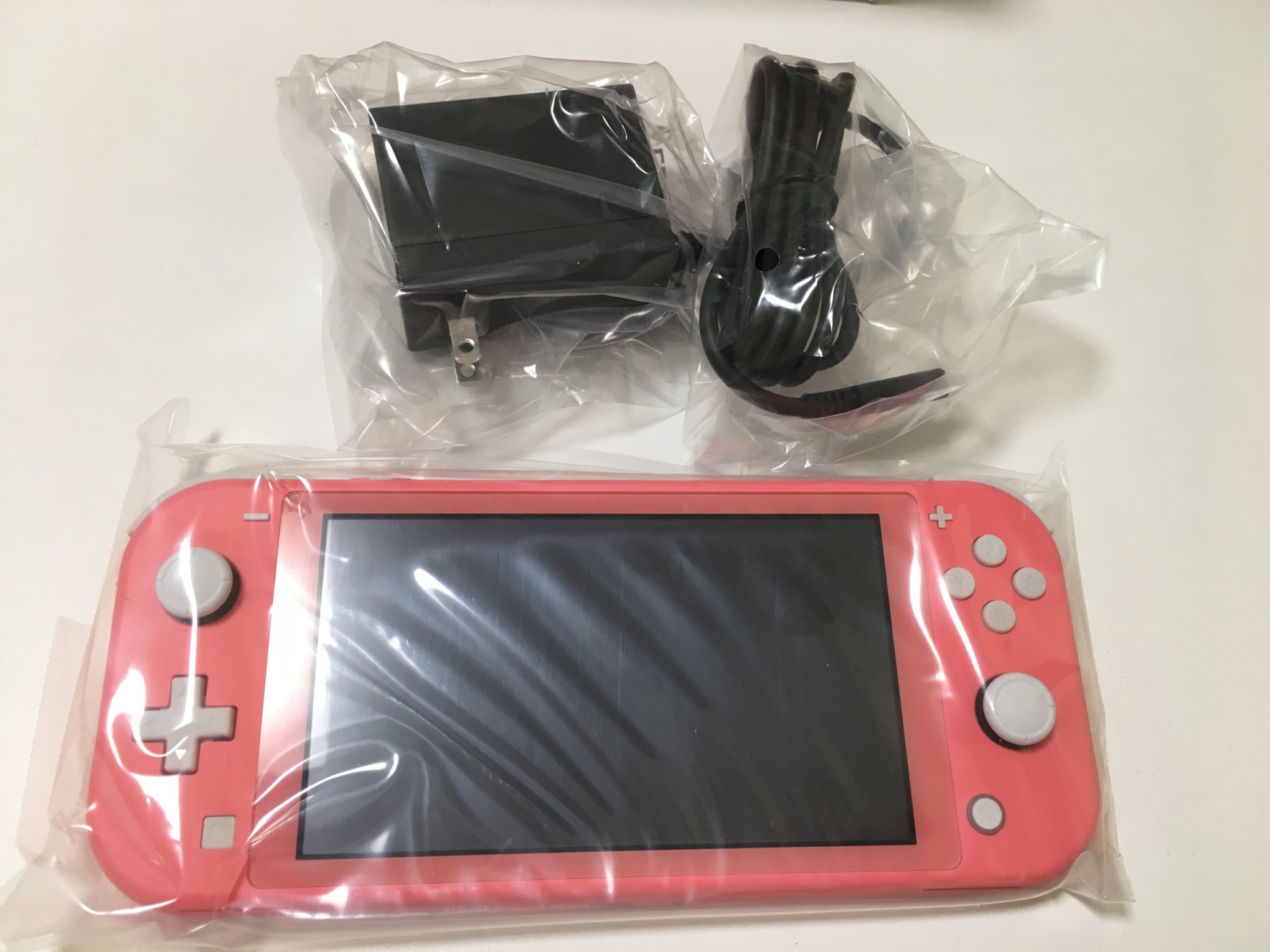 いよいよ人気ブランド Nintendo Switch Lite コーラル asakusa.sub.jp